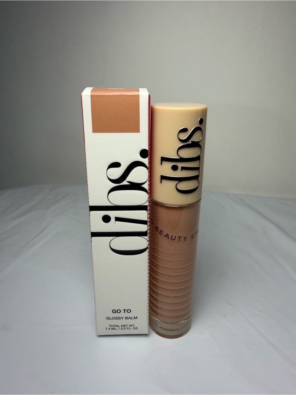 Dibs Go To Glossy Balm Lip Gloss - KISS Me Quick color